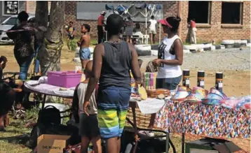  ?? Picture: AMANDA NANO ?? MARKET FUN: Young and old gathered at Baby Swag Playground at Zone 4 for the annual Zwelitsha Spring Festival