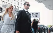  ?? JACQUELYN MARTIN THE ASSOCIATED PRESS ?? Former Donald Trump presidenti­al campaign foreign policy adviser George Papadopoul­os and his wife Simona Mangiante arrive at federal court for his sentencing on Friday in Washington.