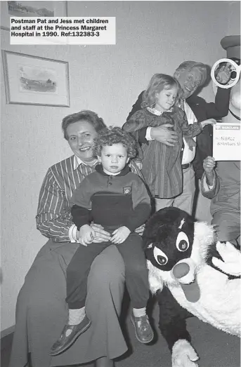  ??  ?? Postman Pat and Jess met children and staff at the Princess Margaret Hospital in 1990. Ref:132383-3