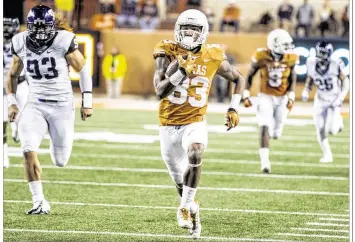  ?? RICARDO B. BRAZZIELL / AMERICAN- STATESMAN ?? Longhorns receiver Armanti Foreman scored the team’s only touchdown on a 73-yard catch-and- run in the fourth quarter. He had four receptions for 91 yards in the loss to TCU on Thursday.