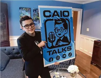  ?? H John Voorhees III/Hearst Connecticu­t Media ?? Caio “Ninja” Leaf, an 11-year-old content creator with autism and a popular YouTube personalit­y, announced the launch of his new project, the “Caio Talks” podcast, during World Autism Acceptance Week. Above, Caio in his home in Danbury on April 3.