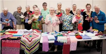  ??  ?? Members of the Fairview wool group, (from left) Edith Olsson, Ethel Armstrong, Coral Watkins, Ann Hooper, Sandra Harionov, Barb Wilson, Peg Parus, Sally Jones (Fairview board member), Jean Morton, Helen Winter, Ester Altamore, Maddie Jones (lifestyle manager) and Val Welfare have been knitting for those affected by the bushfires.
