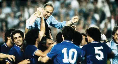  ??  ?? Italian manager Enzo Bearzot carried by his players after winning the World Cup.