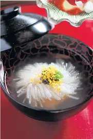  ??  ?? Japanese turnip with kuruma prawn quenelle and Sturia caviar in dashi soup.