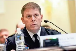  ?? CAROLINE BREHMAN, CQ ROLL CALL VIA AP IMAGES ?? Below, Steven Sund, former chief of the U.S. Capitol Police, says National Guard backup could have helped hold the line against protesters.