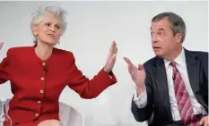  ?? — AFP ?? Former leader of Britain’s UKIP party, Nigel Farage reacts as he speaks with Italianswe­dish MEP Anna Maria Corazza Bildt during a panel discussion at a conference on Brexit, at the Saatchi Gallery in London on Tuesday.