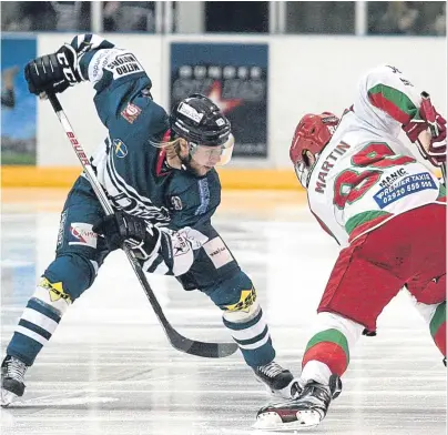  ?? Black. Picture: Derek ?? Stars’ Johan Andersson takes a face-off at Dundee Ice Arena last night with Cardiff Devils’ Joey Martin.