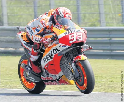  ??  ?? RIGHTHonda’s Marc Marquez rides during qualifying for today’s Thailand Grand Prix in Buri Ram.