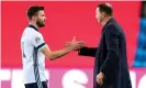  ??  ?? Stuart Dallas (left) with Northern Ireland manager Ian Baraclough after the game in which the Leeds defender scored an unfortunat­e own goal. Photograph: Orn E Borgen/ NTB/AFP/Getty Images