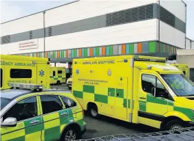  ??  ?? > Emergency ambulances at Ysbyty Glan Clwyd in Denbighshi­re