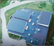  ?? Contribute­d photo ?? An aerial view of a recent rooftop solar project that North Haven-based Greenskies Clear Focus did at the Hale YMCA in Putnam.