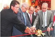  ??  ?? Dr Akima Umezawa, consul-general of Japan in Dubai, Dr Ram Buxani, chairman of ITL Cosmos Group and other senior officials open the debut retail endeavour by Gunze at the Etihad Mall.