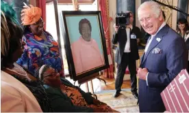  ?? Windrush. Photograph: Reuters ?? King Charles laughs with Edna Henry at a Buckingham Palace reception to mark the 75th anniversar­y of the arrival of HMT Empire