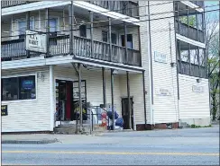  ?? Photo by Ernest A. Brown ?? A.J.’s Market, on Social Street in Woonsocket, is pictured Tuesday, with the area around the storefront and parking lot looking well-kept. Some city officials are concerned that similar stores are becoming eyesores because of too much litter.