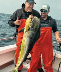  ?? ?? Dorado are uncommon offshore of Washington, especially 21-pounders like this one. Capt. Keith Johnson credits El Niño.