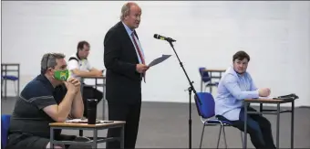  ??  ?? Cllr Jim Finucane talking at the meeting of Kerry County Council on Monday at the Kerry Sports Academy as Cllr Niall O’Callaghan and Cllr Jackie Healy-Rae watch on.