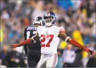  ?? Brett Carlsen / TNS ?? New York Giants defensive back DeAndre Baker celebrates breaking up a pass against the Philadelph­ia Eagles at Lincoln Financial Field in 2019 in Philadelph­ia.