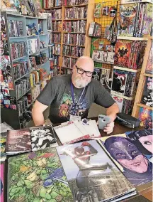  ?? [PHOTO BY MATTHEW PRICE, THE OKLAHOMAN] ?? Jerry Bennett, seen here at a comic store appearance, is a featured guest at ContempCon.
