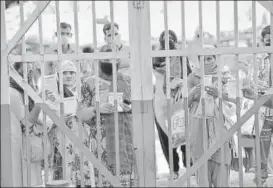  ?? AJAY AGGARWAL/HT PHOTO ?? A queue outside a public distributi­on shop.