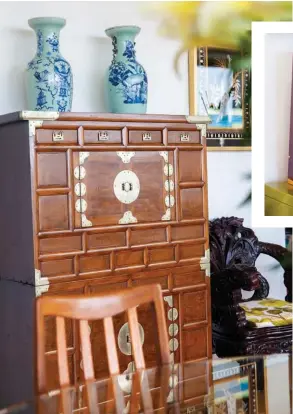  ??  ?? Left: The Korean marriage cabinet was purchased in London and restored by Lorgan’s. The Chinese chair to the right is from Hotlotz, and reminds Andrea of her grandmothe­r’s chairs.