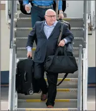  ?? AP PHOTO/ANDREW HARNIK, FILE ?? Washington Capitals head coach Barry Trotz arrives with the team in Sterling, Va. June 8 after defeating the Vegas Golden Knights in Game 5 of the NHL hockey Stanley Cup Finals. Trotz resigned as coach of the Washington Capitals Monday.