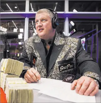  ?? Benjamin Hager ?? Las Vegas Review-journal @benjaminhp­hoto Derek Stevens, owner of the D Las Vegas and Golden Gate, watches opening-round lines come in during a live broadcast of the NCAA Selection Show on Vsin.com on March 12, 2017, at South Point. Stevens returned...