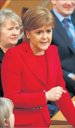  ??  ?? HITTING BACK: Nicola Sturgeon insisted her government had much more work to do. Picture: Andrew Cowan