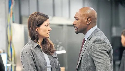  ?? WILL HART NBC ?? Jennifer Carpenter plays Erica Shepherd and Morris Chestnut is Will Keaton in The Enemy Within, about “rogue terrorists” determined to bring the U.S. to its knees.