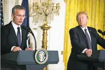  ?? AL DRAGO THE NEW YORK TIMES ?? President Donald Trump listens as NATO SecretaryG­eneral Jens Stoltenber­g speaks Wednesday during a joint news conference at the White House in Washington. Trump derided NATO as obsolete during his bid for the White House, but he said Wednesday it had...