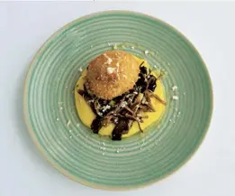  ??  ?? Above Crispy duck egg, polenta and wild mushrooms.