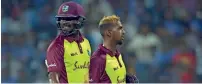  ?? AP ?? Bravo and Pooran were praised by captain Brathwaite. —