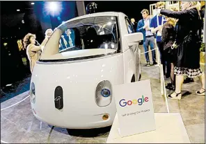  ?? Bloomberg News/MARLENE AWAAD ?? A Google self-driving car drew attention last year at a technology conference in Paris. The developmen­t of graphics processors has led to the more powerful computers needed to automate cars.