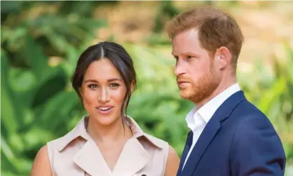  ??  ?? Meghan, the Duchess of Sussex, with Harry in Johannesbu­rg, South Africa. Photograph: Rex/Shuttersto­ck