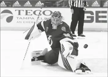  ?? ASSOCIATED PRESS ?? TAMPA BAY LIGHTNING GOALTENDER ANDREI VASILEVSKI­Y (88) makes a save on a shot by the Chicago Blackhawks during the third period of a game on Wednesday in Tampa, Fla.