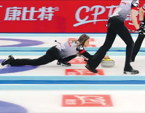  ?? ANDY WONG/THE ASSOCIATED PRESS ?? Skip Rachel Homan and her rink downed Russia 8-3 Sunday in Beijing for Canada’s first world gold since 2008.
