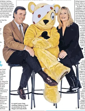  ??  ?? In a good cause: longstandi­ng Children in Need co-presenters Sir Terry Wogan and Gaby Roslin