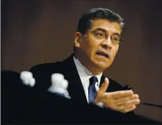  ?? GREG NASH — POOL VIA AP ?? Xavier Becerra testifies during a Senate Finance Committee hearing on his nomination to be secretary of Health and Human Services in February.