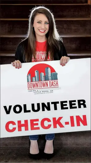  ?? Arkansas Democrat-Gazette/JOHN SYKES JR. ?? Elizabeth Griffin says there will be more than 100 volunteers at Saturday’s Junior League of Little Rock’s Downtown Dash, which will feature 10K and 5K races as well as a 1K run for kids.