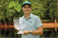  ?? - AFP ?? Rickie Fowler celebrates after winning the Master curtain-raiser.