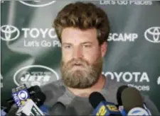  ?? JULIO CORTEZ — THE ASSOCIATED PRESS ?? New York Jets quarterbac­k Ryan Fitzpatric­k talks to reporters during NFL football training camp, Thursday Florham Park, N.J. in