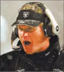  ??  ?? The Associated Press file Then-raiders coach Jon Gruden shouts instructio­ns during a 16-13 overtime loss to the New England Patriots in a 2002 AFC Divisional playoff game.