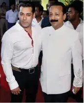  ?? — PTI ?? Salman Khan and Congress leader Baba Siddique (above) at the iftar party hosted by the latter in Mumbai on Saturday. Actress Ileana D’Cruz (left) attends the party.