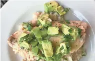  ?? KLETT JENNIFER RUDE ?? Trout with Kiwi-Avocado Salsa and White Wine Rice cooks in the same pot for easy cleanup.