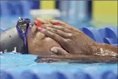  ?? AP photo ?? Simone Manuel reacts after winning the 50meter freestyle Sunday at the U.S. Olympic trials.