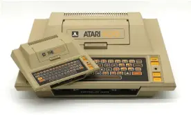  ?? Photograph: Atari/Retro Games ?? Luscious beige, orange and brown … the Atari 400 Mini.