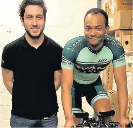  ??  ?? Celso Fonseca, 36, right, with Ethan O’Hara, from Evans Cycles, which sponsored Celso.