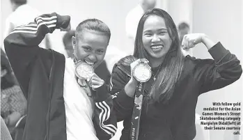  ??  ?? With fellow gold medalist for the Asian Games Women’s Street Skateboard­ing category Margielyn Didal( left) at their Senate courtesy call.