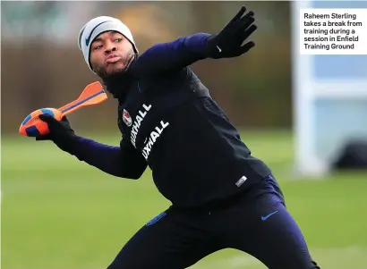  ??  ?? IT is only a small detail but it says everything about the specificit­y of Pep Guardiola’s coaching and the little observatio­ns and improvemen­ts he wants to make in his players’ games. Raheem Sterling takes a break from training during a session in...