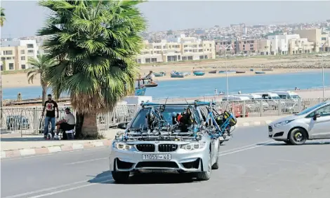  ?? Paul Schemm/The As ociated Press /file ?? Tom Cruise drives a BMW covered with cameras while shooting a scene for Mission Impossible 5 in Rabat, Morocco.