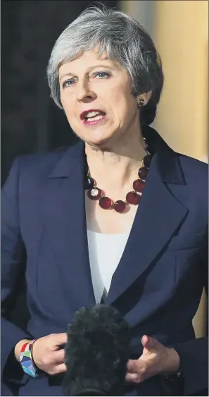  ?? PICTURE: VICTORIA JONES/PA ?? ‘CHOICE IS CLEAR’: Theresa May makes her statement after winning Cabinet support.